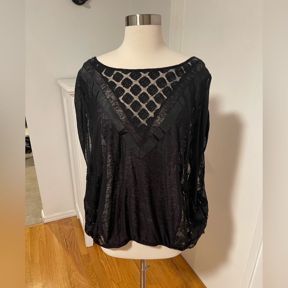 Free People cap sleeve shirt.